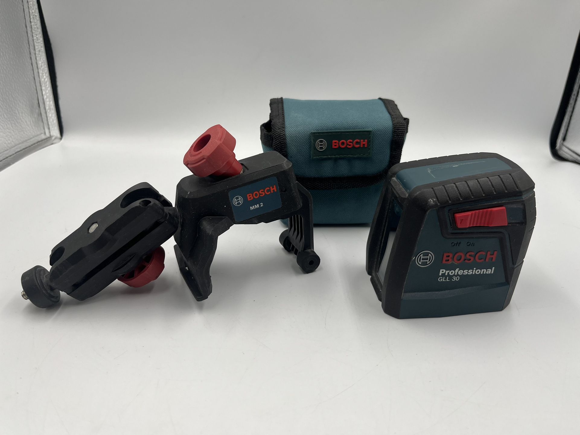 Bosch GLL 30 Self-Leveling Cross-Line Laser Level with carrying pouch.
