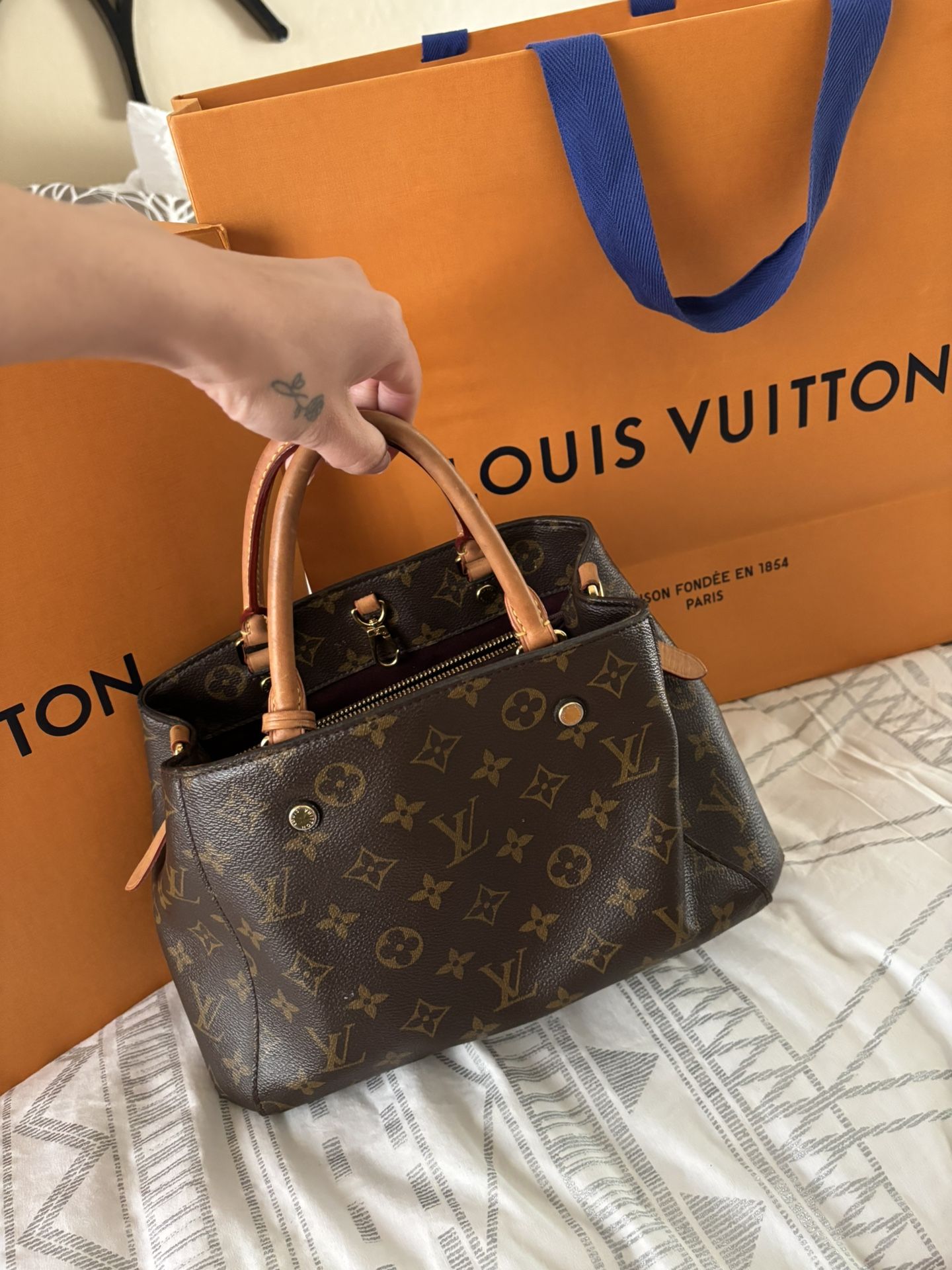 Selling My 4 Year Old Montaigne Louis Vuitton!