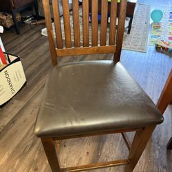 Brown Wooden Chair With Black Cushion 