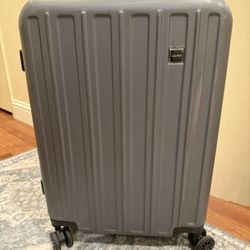 Suitcase 24” X 16” . 