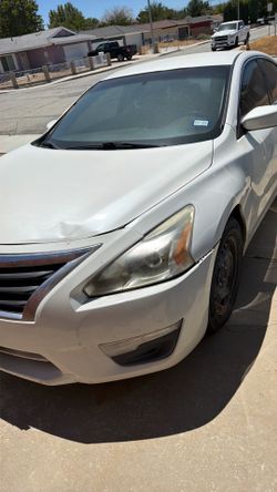 Salvage out of state  2015 Nissan Altima S