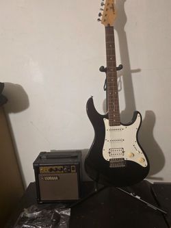 Electric Guitar With accessories /Amp Yamaha