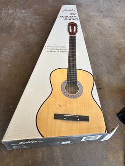 Acoustics guitar 39”