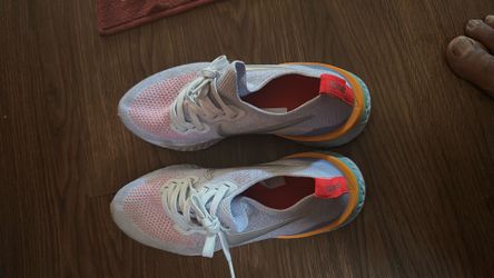 Nike Epic React Flyknit 2 purple and pink running trainers