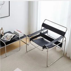 Modern black chair with metal frame