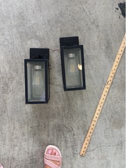 2 black metal outdoor garage lights