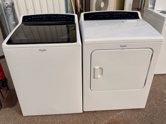 Whirlpool Top load washer and electric dryer