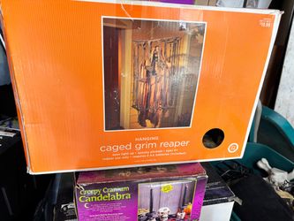 Caged Grim Reaper Halloween decor