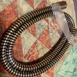 New - never used - Delta 59-Inch Chrome/Black Vinyl Shower Hose