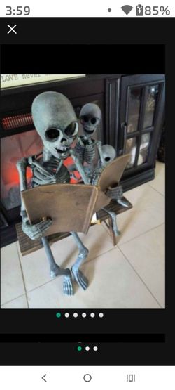 Metal outdoor/indoor Halloween decor - skeleton family reading on a bench   NEW WITH TAGS! RARE FIND! from Home Goods!