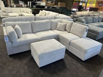 Comfy Reversible Chaise Sectional And Ottoman 