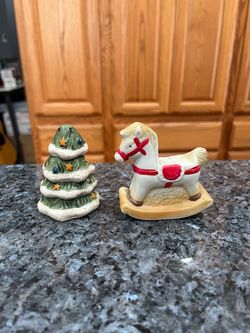 Vintage Ceramic Christmas Tree and a Rocking Horse Pair of salt and pepper shakers. Size approximately 3 inches tall. Preowned never used. Has been
