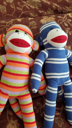two 2 sock monkey almost new ...