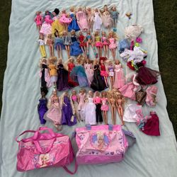 50 Barbies With Clothes And Carrying Bags