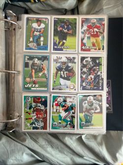 Binder of football cards