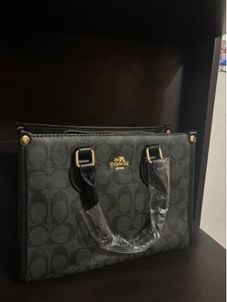 Black coach tote bag