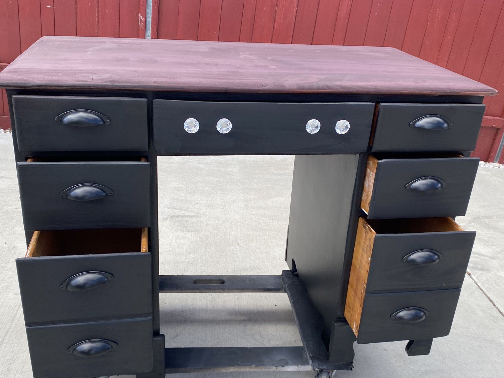 black wood vintage desk with Red top 7 drawers