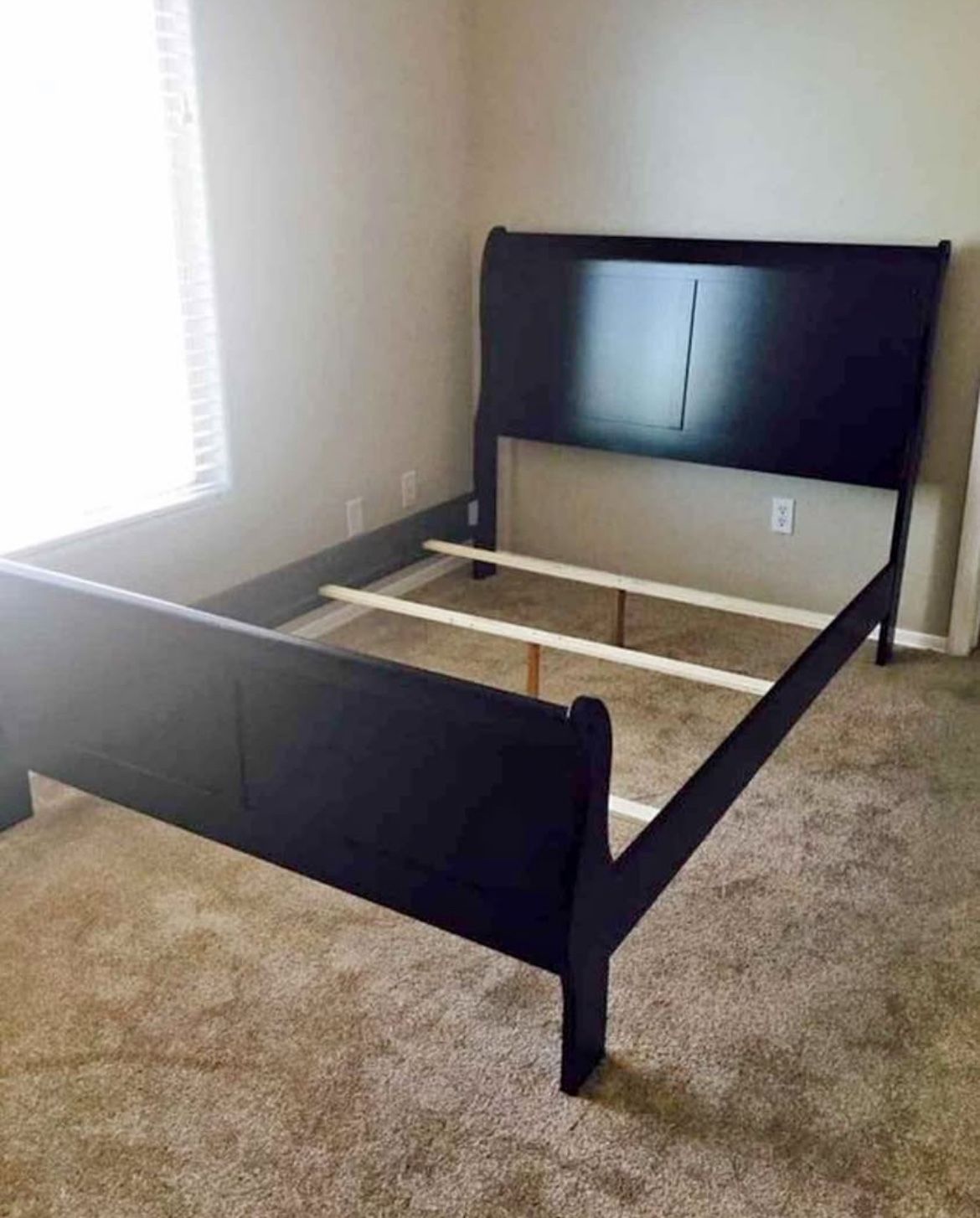 queen size black wood sleigh bed frame.