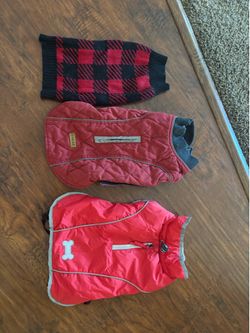 3 medium dog vests and sweaters ( my dog was 15lb