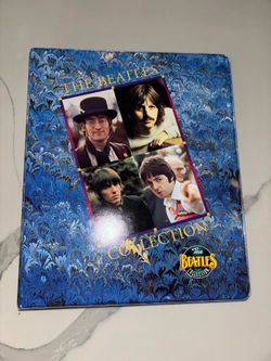The Beatles 1993 complete set of 220 trading cards with original binder.