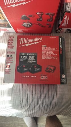New  Milwaukee batteries with charger
