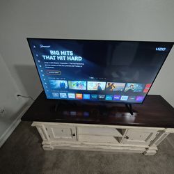 brand new 43-inch VIZIO TV with TV stand