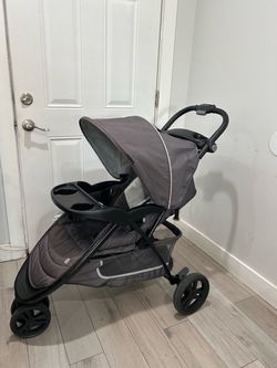 Gray Baby Stroller with Canopy and Tray
