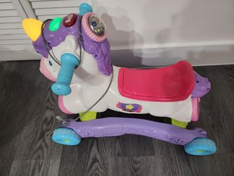 Unicorn ride on toy with lights and music