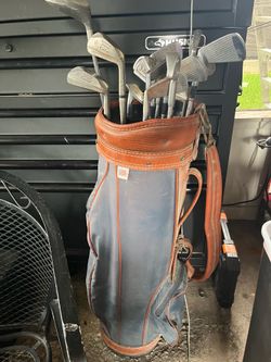 Vintage golf clubs and bag