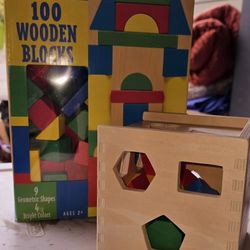 Melissa and the wooden blocks and shape Sorting cube