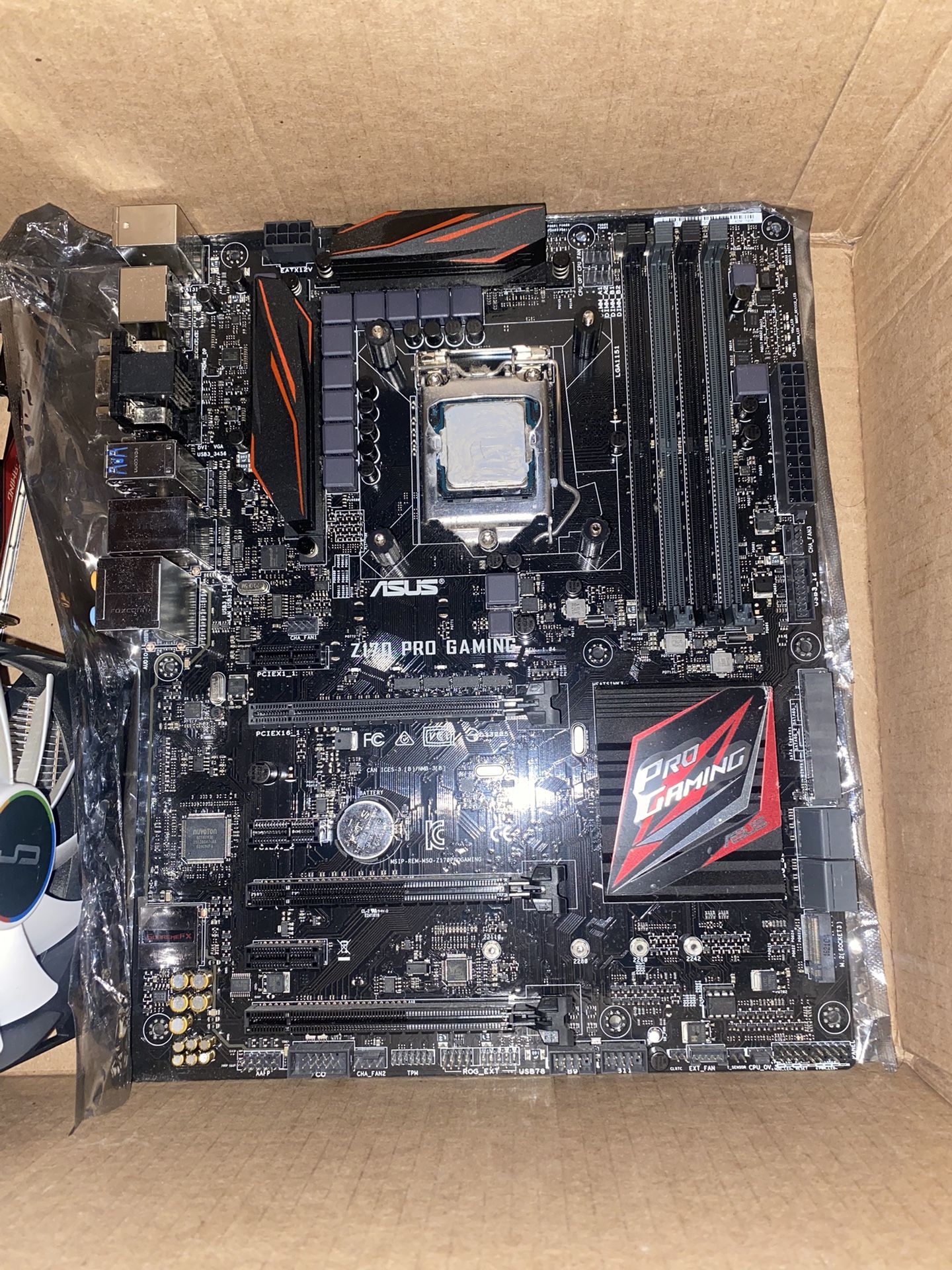 Z170 Pro gaming motherboard with a i5 6600k (comes with IO shield) fully working