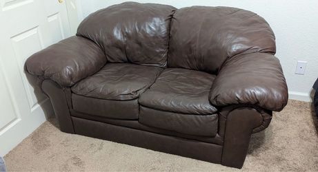 Beautiful brown leather loveseat