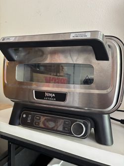 Ninja Artisan 5-in-1 Portable Electric Pizza & Outdoor Oven (Model MO201 Series).