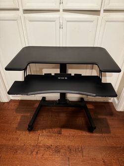 Adjustable height desk