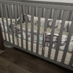 Gray crib 
