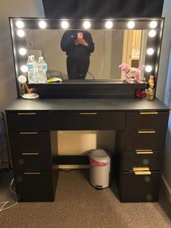 Black + Gold Vanity w Light Bulbs