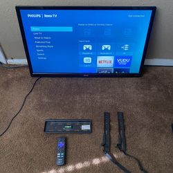 32 inch TV with Remote and TV mount with the screws