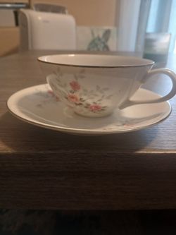 ​Item: A vintage-style porcelain teacup and matching saucer set
