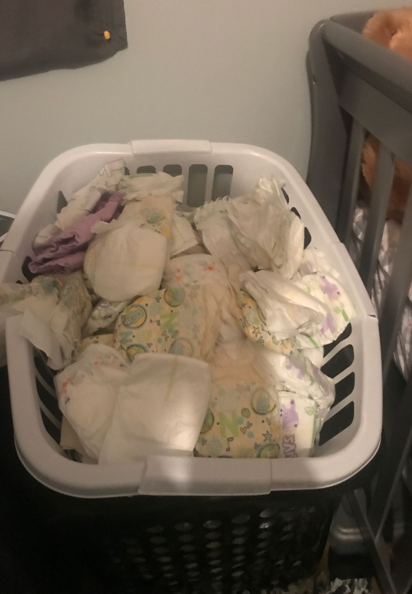 Basket of unused newborn diapers