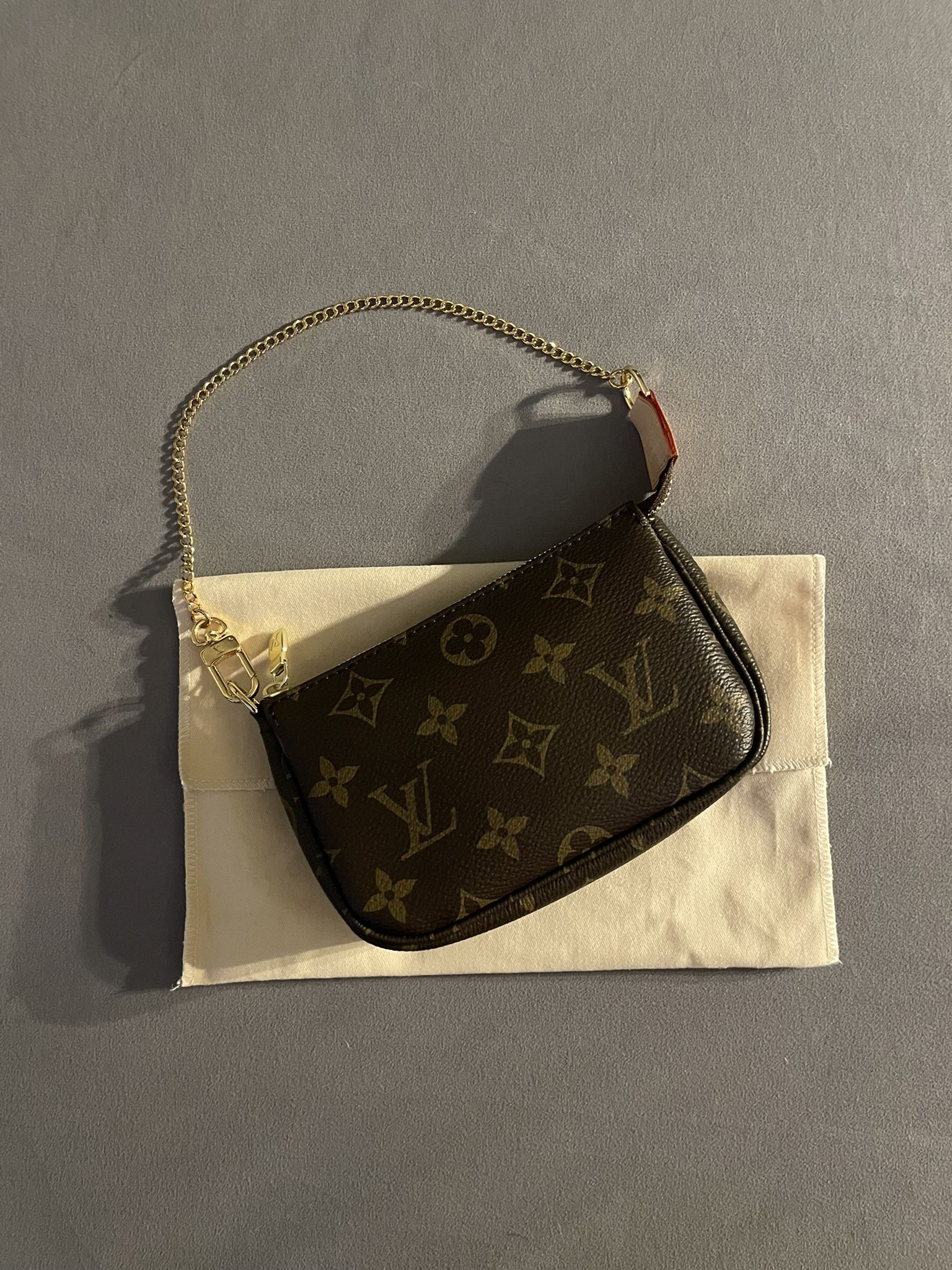 BRAND NEW - Louis Vuitton Mini Pochette
