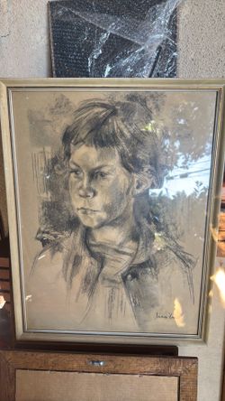 This image shows an original mid-20th-century charcoal or graphite portrait drawing of a young individual, signed and dated '60 in the lower right cor