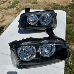 06-10 Dodge Charger Headlights New Defective 