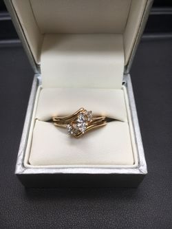 14k marquise diamond yellow gold ring.