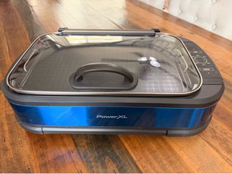 Used Power XL smokeless griddle and grill in blue color.