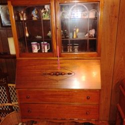 Slant front secretary with bookcase top