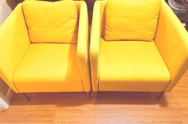 Pair of yellow IKEA EKERO Armchairs