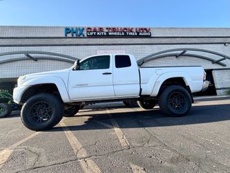 Toyota Tacoma wheels tires leveling & lift kits accessories side steps bed covers intakes insulations. (we Finance)