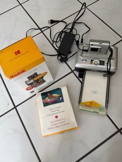 Camera and printer and supplies.
