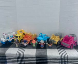 Little people with various trucks included