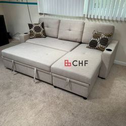 Convertible sectional sofa with storage chaise and pull out bed with cupholder 